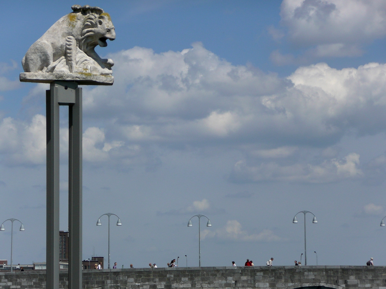 The Roman remains of a lion sculpture now marks the site of the original Roman bridge along the banks of the Maas River.  