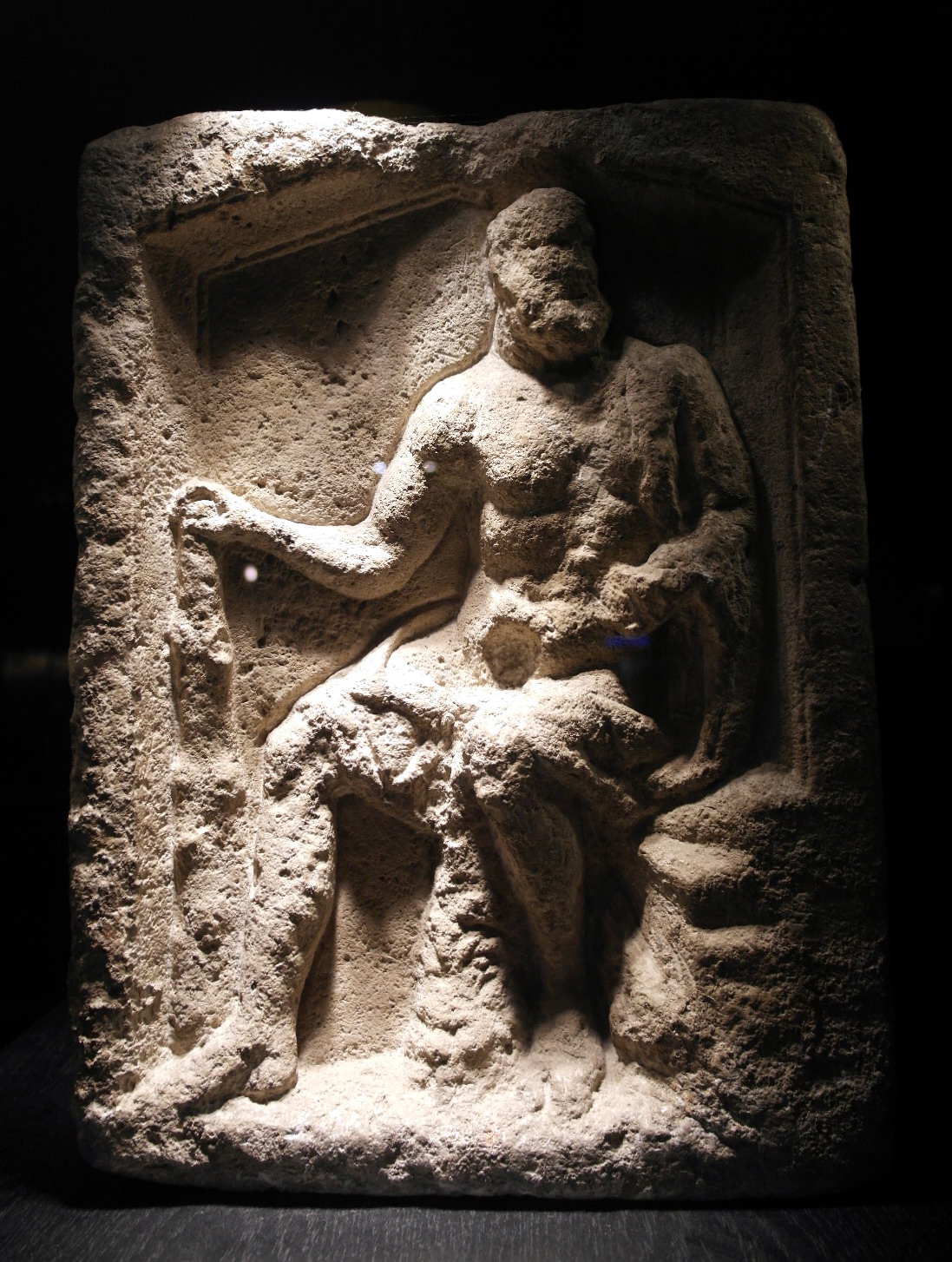 Relief of Hercules with a club from excavation of Sanctuary of Jupiter, Maastricht.